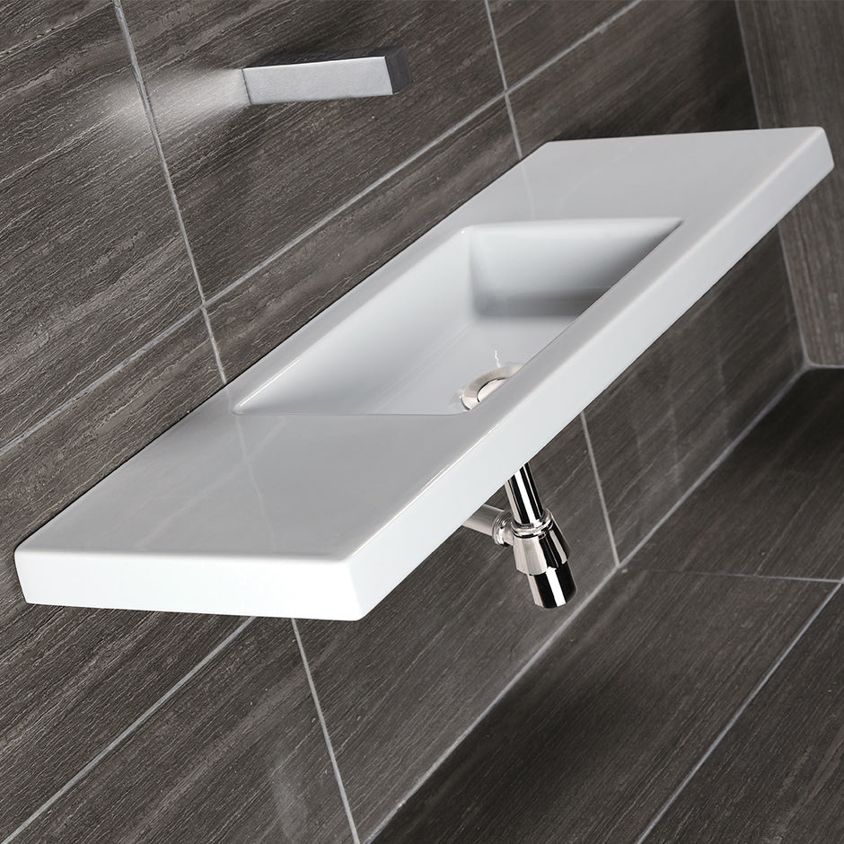 Wall-mount, vanity top or self-rimming porcelain Bathroom Sink with an overflow. One faucet hole on either left side or right side. W: 39 1/2", D: 13 3/4", H: 5 1/2". - Maison&Co.