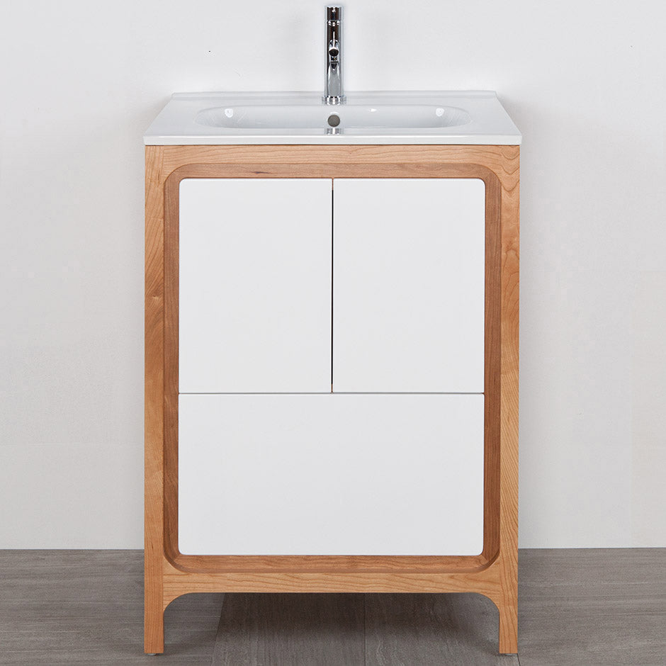 Free standing under counter vanity with routed finger pulls on two doors and one drawer. Bathroom Sink sold separately. Multi finish combinations are custom. W: 23 3/4", D: 17 3/4", H: 34" - Maison&Co.