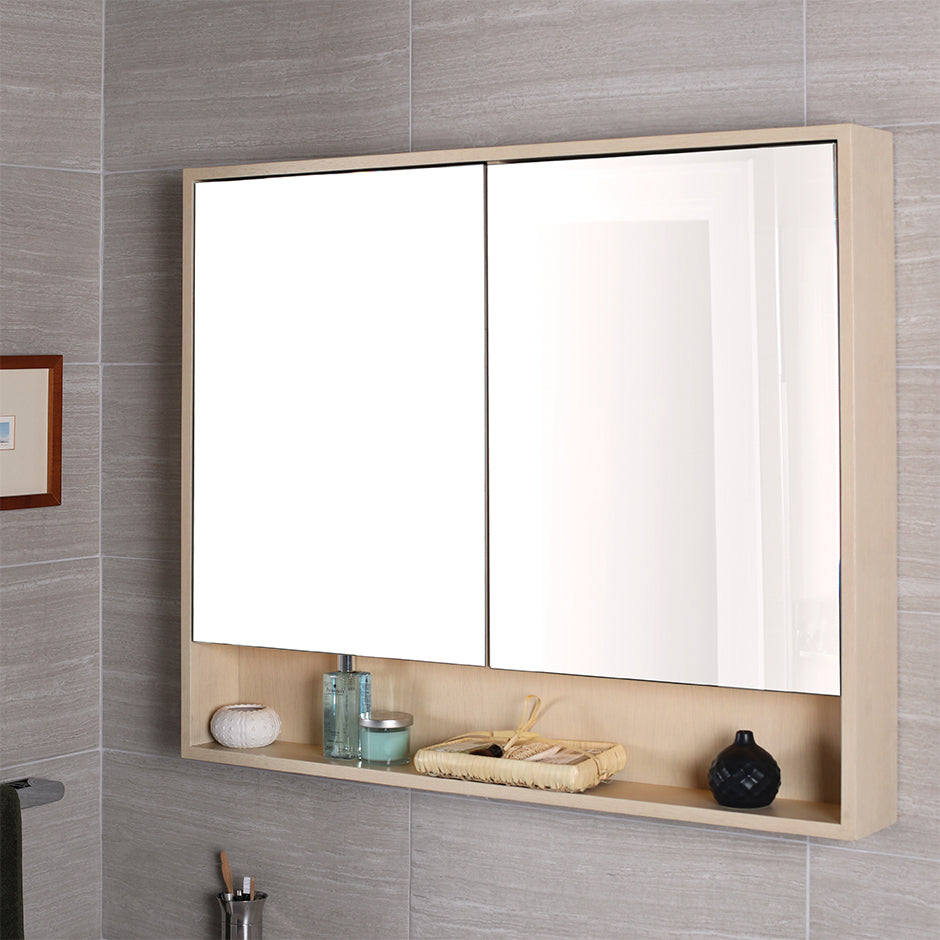 Surface-mount medicine cabinet with two mirrored doors, two adjustable glass shelves in each section and LED lights in cubby.  W: 41", D: 5", H: 34". - Maison&Co.