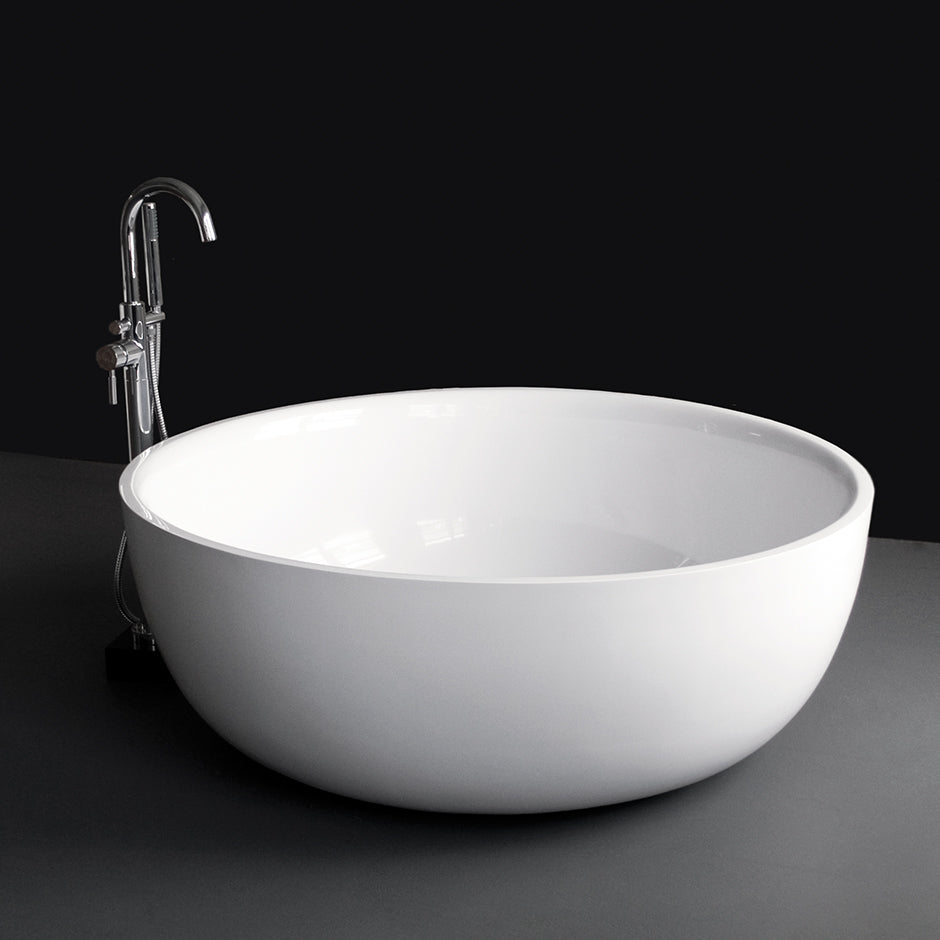Free-standing soaking bathtub made of white solid surface with a decorative solid surface drain, no overflow, net weight 397 lbs, water capacity 122 gal. DIAM: 52 7/8” H: 19 1/2 - Maison&Co.