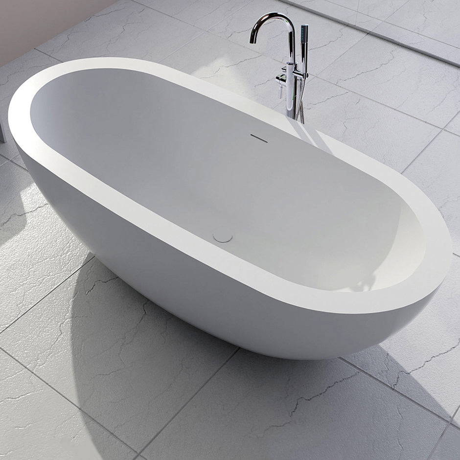 Free-standing soaking bathtub made of white solid surface with an overflow andndrain, net weight 364 lbs, water capacity 73 Gal.W: 70 7/8” D: 31 1/2” H: 23 5/8” - Maison&Co.