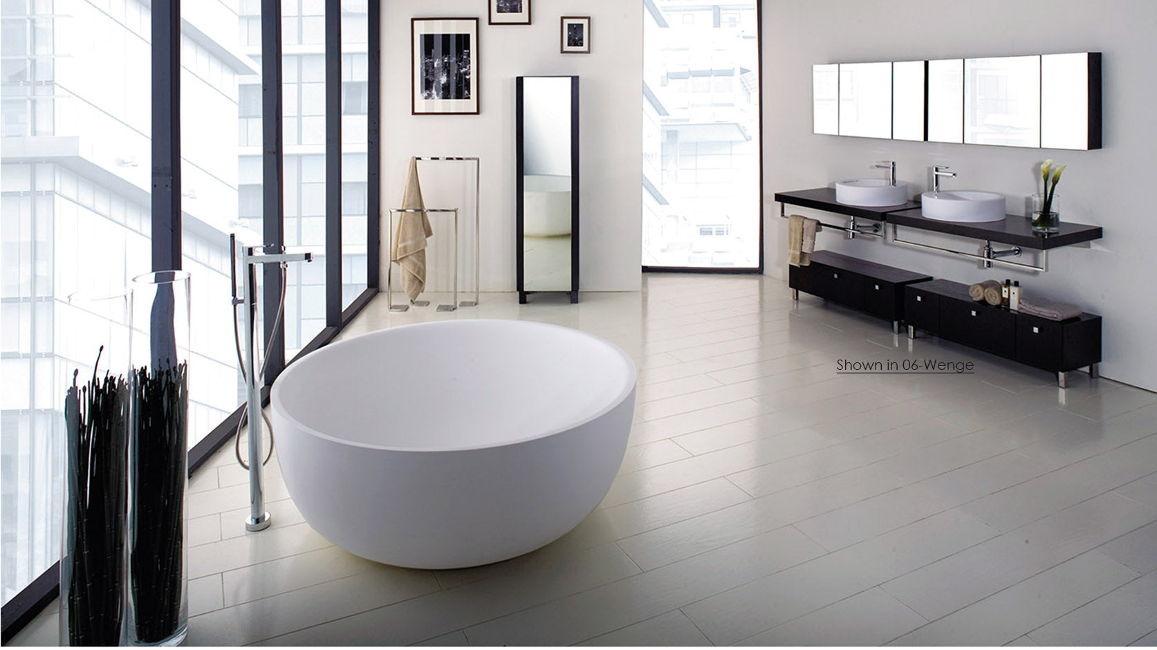 Free-standing soaking bathtub made of white solid surface with a decorative solid surface drain, no overflow, net weight 397 lbs, water capacity 122 gal. DIAM: 52 7/8” H: 19 1/2 - Maison&Co.