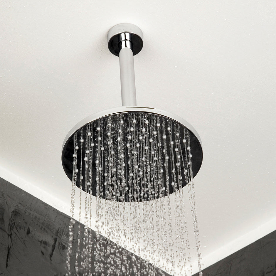 Wall-mount or ceiling-mount tilting round rain shower head, 95 rubber nozzles. Arm and flange sold separately