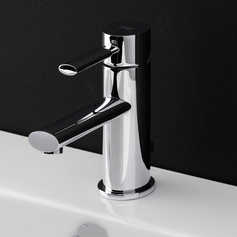 Deck-mount single-hole faucet with a lever handle and pop-up, ADA compliant. Water flow rate: 1 gpm pressure compensating aerator.
