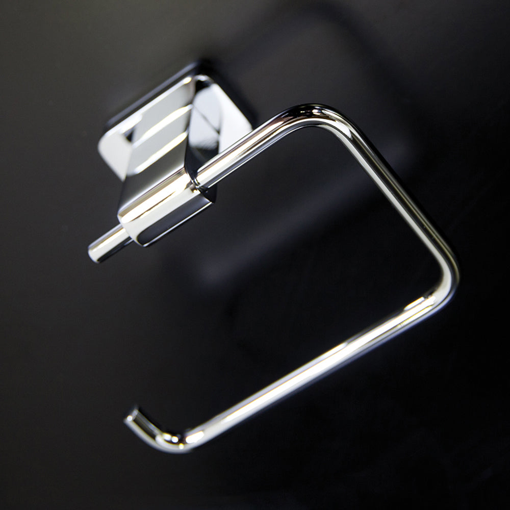 Wall mount toilet paper holder made of chrome plated brass. W: 5 3/8", D: 2 5/8", H: 4 3/8" - Maison&Co.