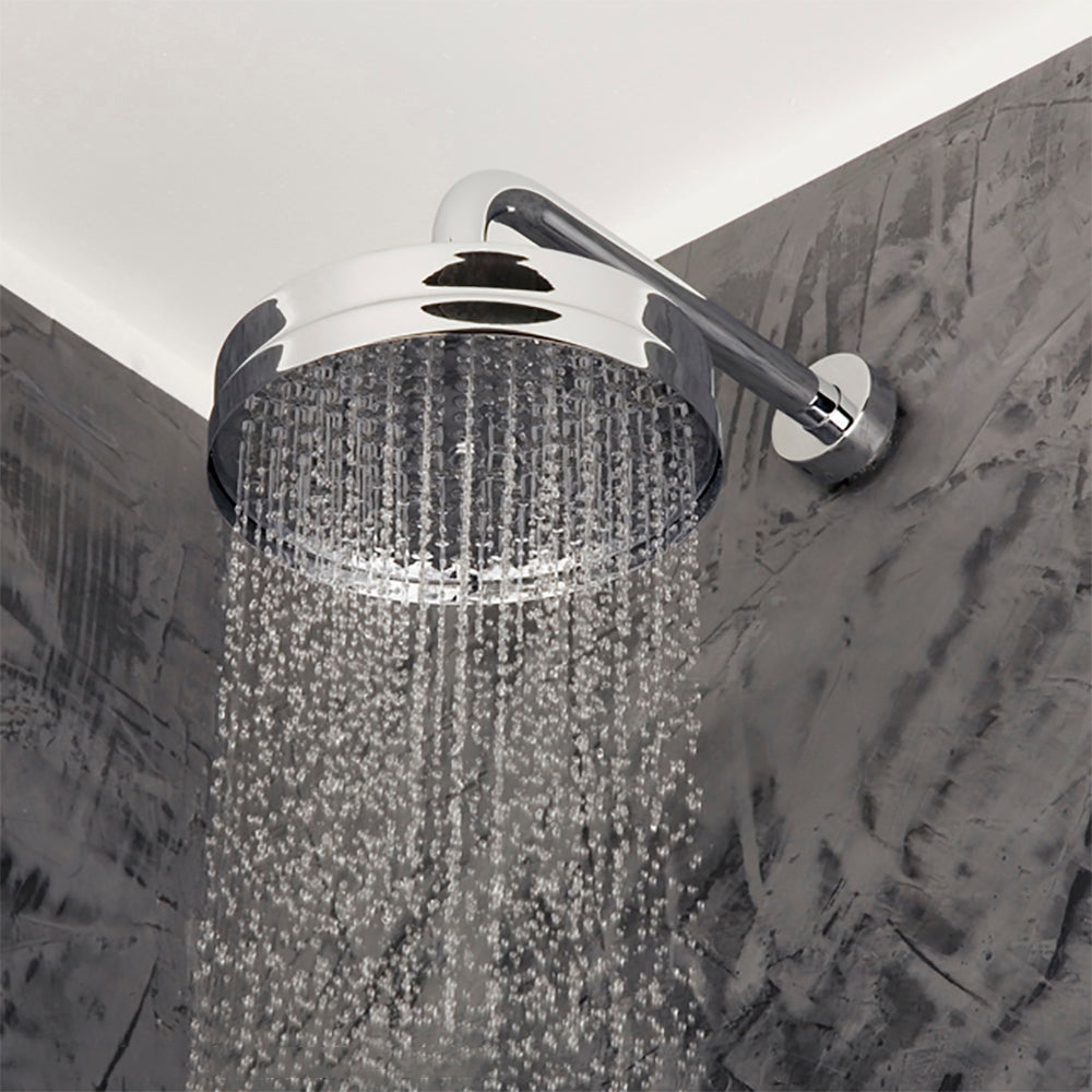 Wall-mount or ceiling-mount tilting round rain shower head, 140 outlet holes. Arm and flange sold separately. DIAM :8" H: 3 1/2"