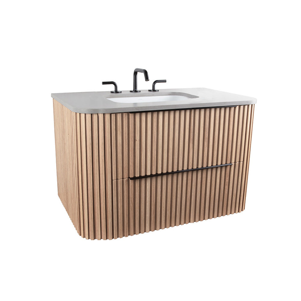 Wall-mount under-counter vanity with rounded corners, fluted detailing and two drawers. Countertop FLT-24T and sink H270 sold separately. Shipping class 4. W: 23-1/2", D: 21-3/4", H:22"