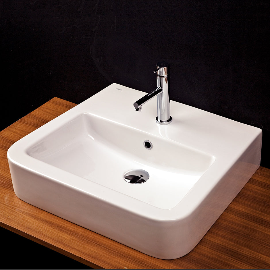 Wall-mount or above-counter porcelain Bathroom Sink with an overflow. Unfinished back. 24"W, 19"D, 7"H. Three faucet hole