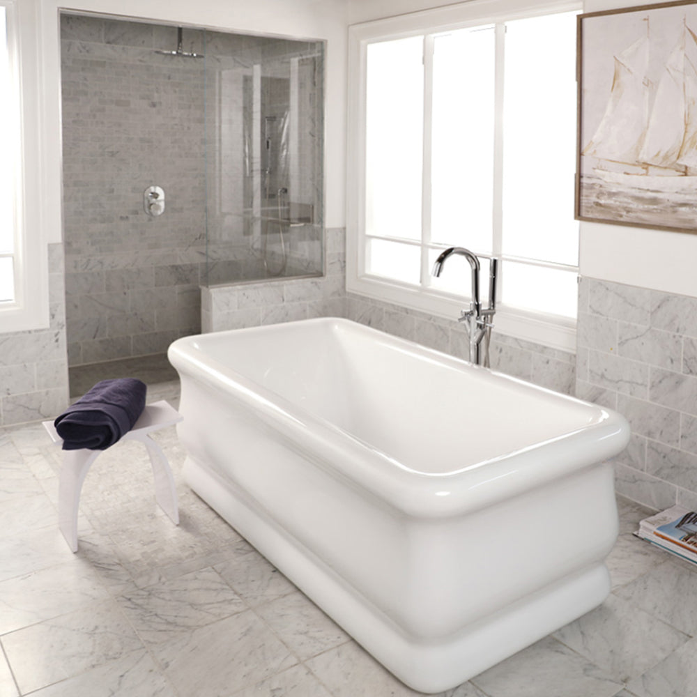 Free-standing soaking bathtub made of luster white acrylic with an overflow and polished chrome drain,  net weight 133 lbs, water capacity 84.5 gal, W: 71”, D: 33 1/2”, H: 24 7/8”.