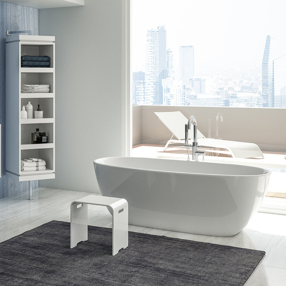 Free-standing soaking bathtub made of white solid surface with an overflow and a decorative solid surface drain; net weight 298 lbs, water capacity 73 gal. W: 63", D:31 1/2", H:21 5/8".